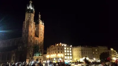 Limits of credit cards international travel insurance : Night visit of Krakow, Poland market square